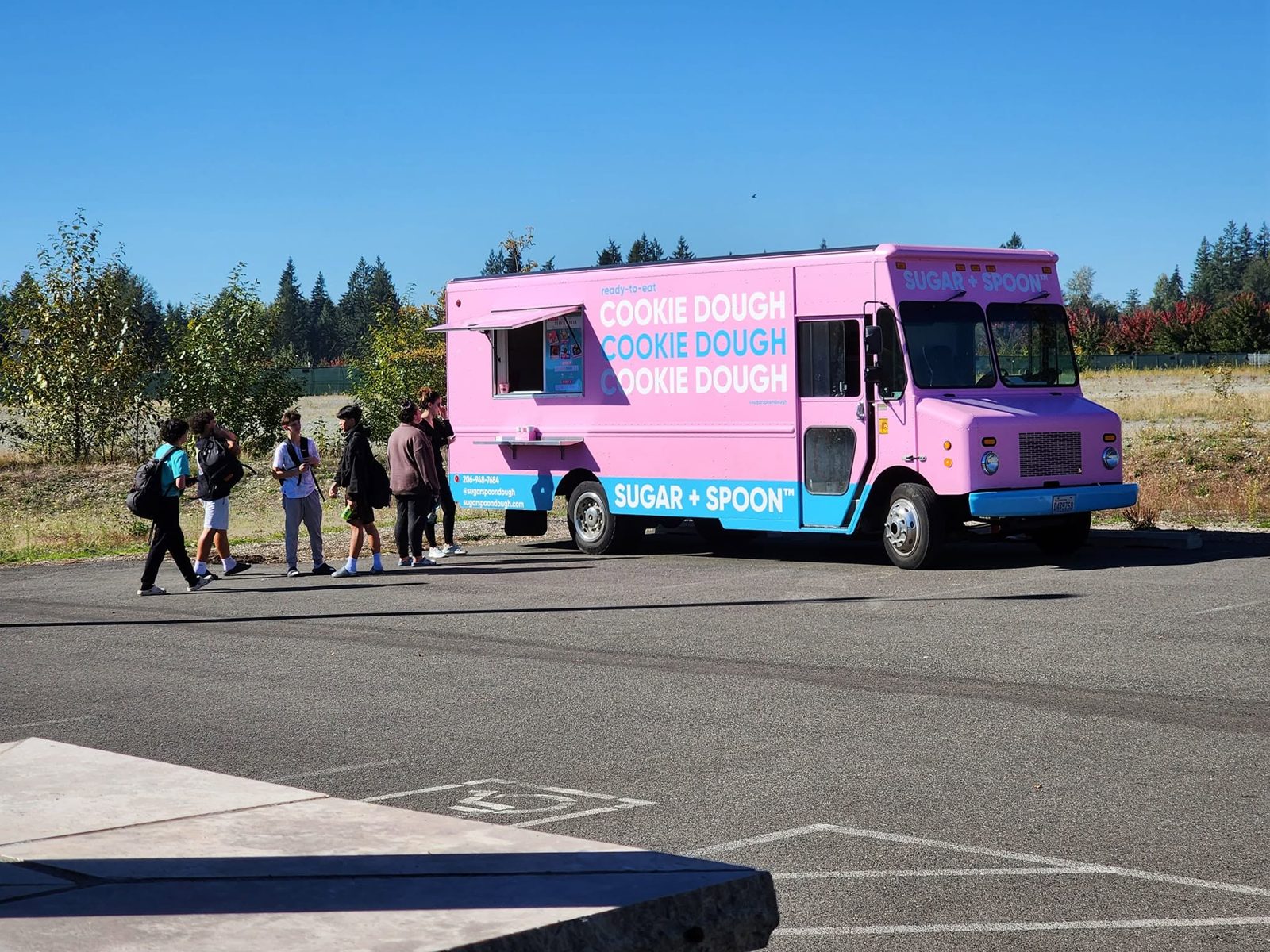 Guests lining up at the Sugar + Spoon truck