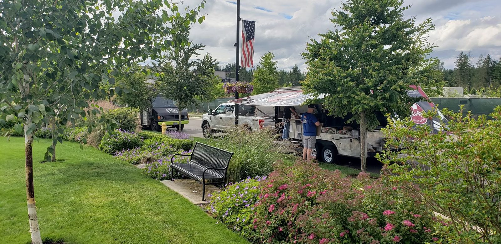Food trucks along the green at The Commons
